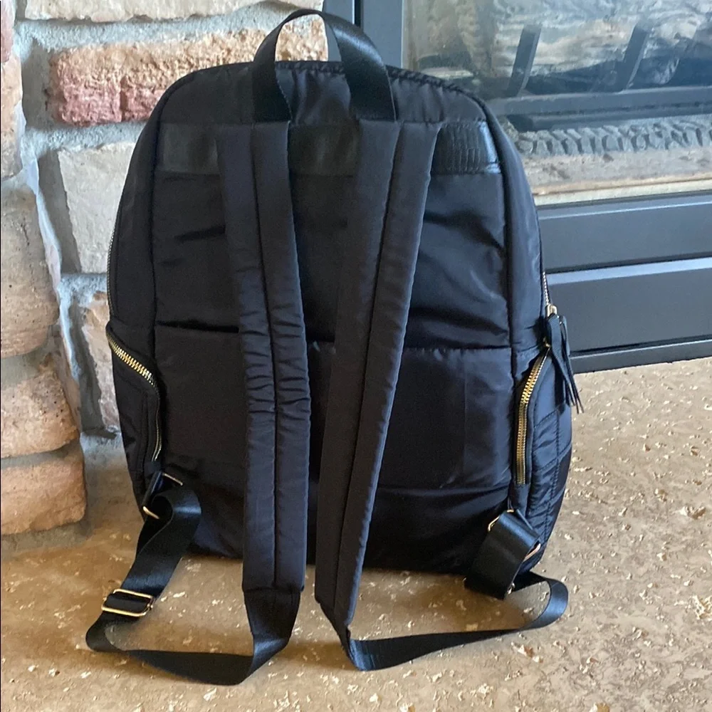 Adrienne Vittadini Black and Gold Backpack with Quilted Design Excellent cond.